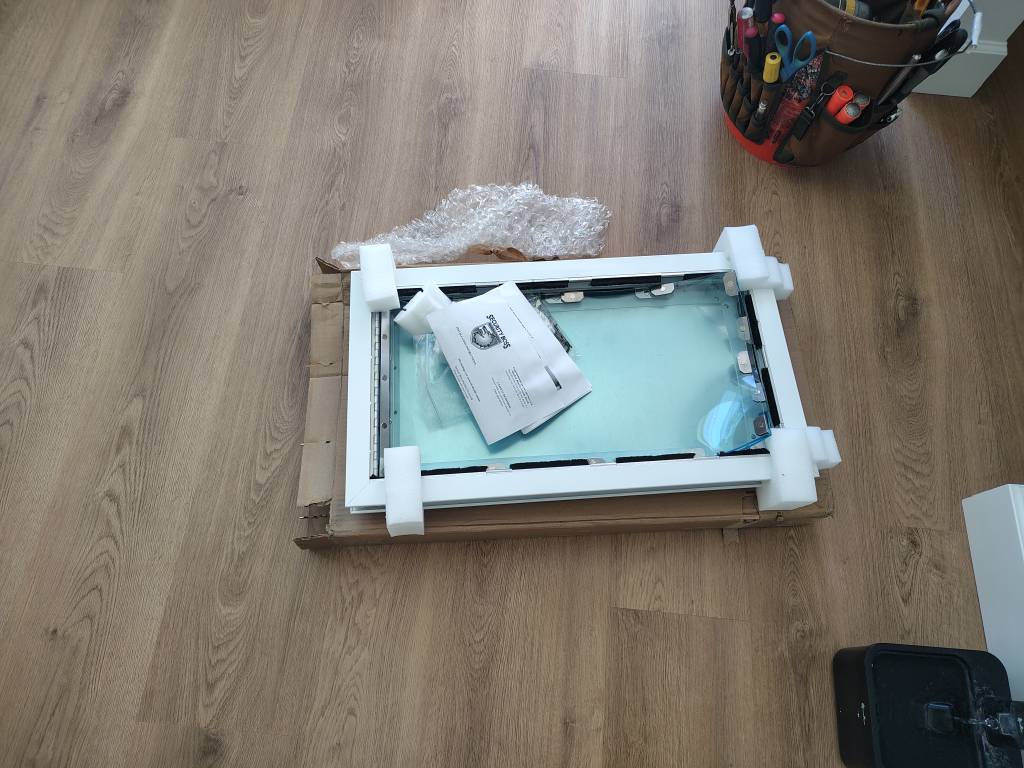 Security Boss pet door unboxed and ready for installation